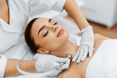 Face Skin Care. Diamond Microdermabrasion Peeling Treatment, Beauty Spa. Cosmetology. royalty free stock photography Face Skin Care. Diamond Microdermabrasion Peeling Treatment, Beauty Spa. Cosmetology. royalty free stock photography
