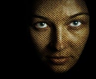 Face of woman with textured skin mask stock image Face of woman with textured skin mask stock image