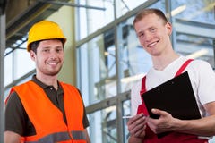 Factory workers and the project manager royalty free stock image Factory workers and the project manager royalty free stock image