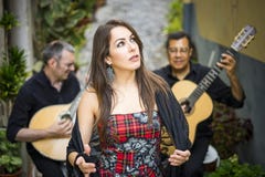 Fado band performing traditional portuguese music on the street stock image Fado band performing traditional portuguese music on the street stock image