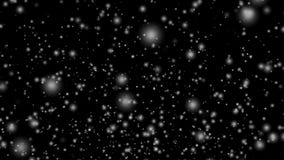 Falling snow video on black screen