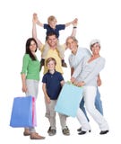 Famiglia felice delle generazioni con i sacchetti di acquisto Fotografie Stock Libere da Diritti Famiglia felice delle generazioni con i sacchetti di acquisto Fotografie Stock Libere da Diritti