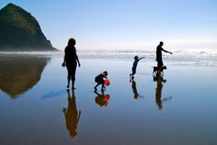 Family of Beachcombers Silhouettes stock images Family of Beachcombers Silhouettes stock images