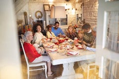 Family celebrating Christmas time and enjoy Christmas traditional dinner stock photography Family celebrating Christmas time and enjoy Christmas traditional dinner stock photography