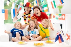 Fans watch football game. Family watching soccer. stock photography Fans watch football game. Family watching soccer. stock photography