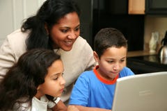 Family on Computer stock photo Family on Computer stock photo