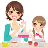 Family Decorating Cupcakes Royalty Free Stock Image Family Decorating Cupcakes Royalty Free Stock Image