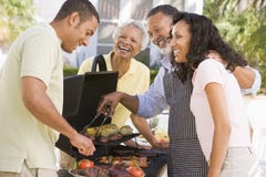 Free Family Enjoying A Barbeque Stock Photo - 7230570