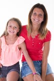 Family girls mother and pretty daughter on white royalty free stock images Family girls mother and pretty daughter on white royalty free stock images