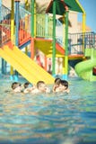 Family having fun in pool stock photography Family having fun in pool stock photography