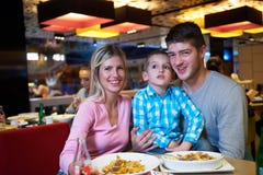 Family having lunch in shopping mall Stock Images Family having lunch in shopping mall Stock Images
