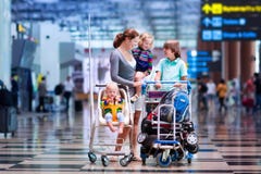 Family with kids at airport stock photos Family with kids at airport stock photos
