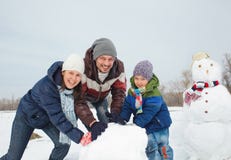 Family Make A Snowman Stock Photography Family Make A Snowman Stock Photography