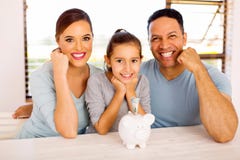 Family with piggybank Stock Photos Family with piggybank Stock Photos