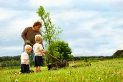 Family Planting Tree