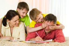 Family playing on the carpet royalty free stock images Family playing on the carpet royalty free stock images