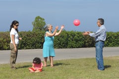 Family Playing With A Ball Royalty Free Stock Photo