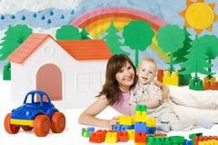 Baby Mother Play Lego Blocks Toys in Home, Family House Car royalty free stock photography Baby Mother Play Lego Blocks Toys in Home, Family House Car royalty free stock photography