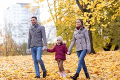 Happy family walking at autumn park Stock Photography Happy family walking at autumn park Stock Photography