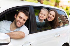 Family sitting in the car looking out windows Royalty Free Stock Photos Family sitting in the car looking out windows Royalty Free Stock Photos