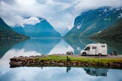 Family vacation travel, holiday trip in motorhome. Caravan car Vacation. Beautiful Nature Italy natural landscape Alps Stock Images Family vacation travel, holiday trip in motorhome. Caravan car Vacation. Beautiful Nature Italy natural landscape Alps Stock Images