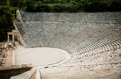 Famous Greek ancient empty amphitheater in Epidaurus, Greece Royalty Free Stock Image Famous Greek ancient empty amphitheater in Epidaurus, Greece Royalty Free Stock Image