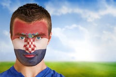 Fan de futebol da Croácia na pintura da cara imagem de stock Fan de futebol da Croácia na pintura da cara imagem de stock