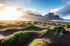 Fantastic West Of The Mountains And Volcanic Lava Sand Dunes On The Beach Stokksness, Iceland. Colorful Summer Morning Royalty Free Stock Image