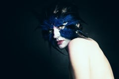 Fantasy concept. Woman with Art Makeup. Fantasy Blue Bird. Stage Makeup Stock Photo Fantasy concept. Woman with Art Makeup. Fantasy Blue Bird. Stage Makeup Stock Photo