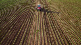 Farming Tractor Plowing And Spraying On Wheat Field Royalty Free Stock Photos Farming Tractor Plowing And Spraying On Wheat Field Royalty Free Stock Photos