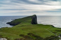Faro del punto di Neist all'isola di Skye, altopiano scozzese Fotografia Stock Libera da Diritti Faro del punto di Neist all'isola di Skye, altopiano scozzese Fotografia Stock Libera da Diritti