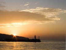 Faro di tramonto Fotografia Stock Libera da Diritti Faro di tramonto Fotografia Stock Libera da Diritti