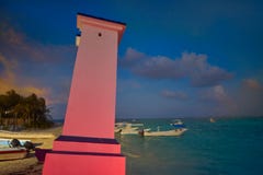 Faro piegato tramonto del Morelos di Puerto fotografia stock libera da diritti Faro piegato tramonto del Morelos di Puerto fotografia stock libera da diritti