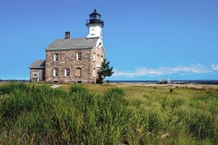 Farol de pedra popular na ilha em Connecticut fotos de stock Farol de pedra popular na ilha em Connecticut fotos de stock