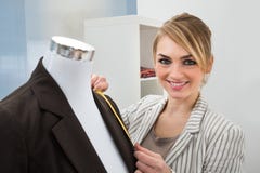Fashion designer measuring suit royalty free stock image Fashion designer measuring suit royalty free stock image