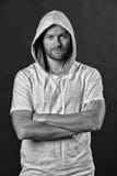 Fashion model in hoodie tshirt. Man with beard wear hood. Bearded man in casual sweatshirt. Active lifestyle and health royalty free stock images Fashion model in hoodie tshirt. Man with beard wear hood. Bearded man in casual sweatshirt. Active lifestyle and health royalty free stock images