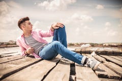 Casual Man Fashion Pose Lying Down Stock Photos, Images, & Pictures ...