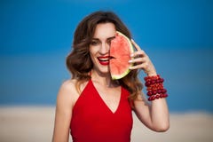 Fashion outdoor photo of a sensual beautiful woman with red royalty free stock image Fashion outdoor photo of a sensual beautiful woman with red royalty free stock image