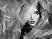 Fashion photo of beautiful women under blue veil stock images Fashion photo of beautiful women under blue veil stock images