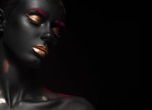 Fashion portrait of a dark-skinned girl with color