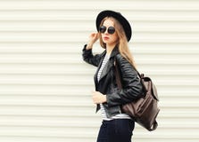 Fashion pretty cool woman in black rock style over white royalty free stock images Fashion pretty cool woman in black rock style over white royalty free stock images