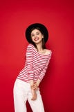 Pretty young lady in striped blouse and black hat royalty free stock photos Pretty young lady in striped blouse and black hat royalty free stock photos