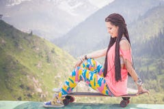 Fashion teenager girl with longboard skateboard at mountain royalty free stock photos Fashion teenager girl with longboard skateboard at mountain royalty free stock photos