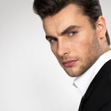 Fashion young businessman in black suit stock photo Fashion young businessman in black suit stock photo