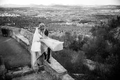 Fashionable wedding couple. Bride and Groom. Black and white photography. Outdoor portrait royalty free stock photography Fashionable wedding couple. Bride and Groom. Black and white photography. Outdoor portrait royalty free stock photography
