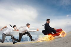 Fast businessman with a car wins against the competitors. Concept of success and competition stock photography Fast businessman with a car wins against the competitors. Concept of success and competition stock photography