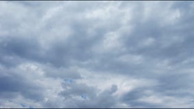 Fast-moving white clouds against the blue sky. stock video Fast-moving white clouds against the blue sky. stock video