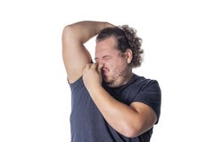 Fat man holds or pinches his nose shut because of a stinky smell or odor stock photo Fat man holds or pinches his nose shut because of a stinky smell or odor stock photo