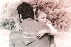 Father and daughter with Happy fathers day. Happy fathers day against photograph of family royalty free stock photography Father and daughter with Happy fathers day. Happy fathers day against photograph of family royalty free stock photography
