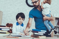 Father is Doing a Homework with Son stock images Father is Doing a Homework with Son stock images